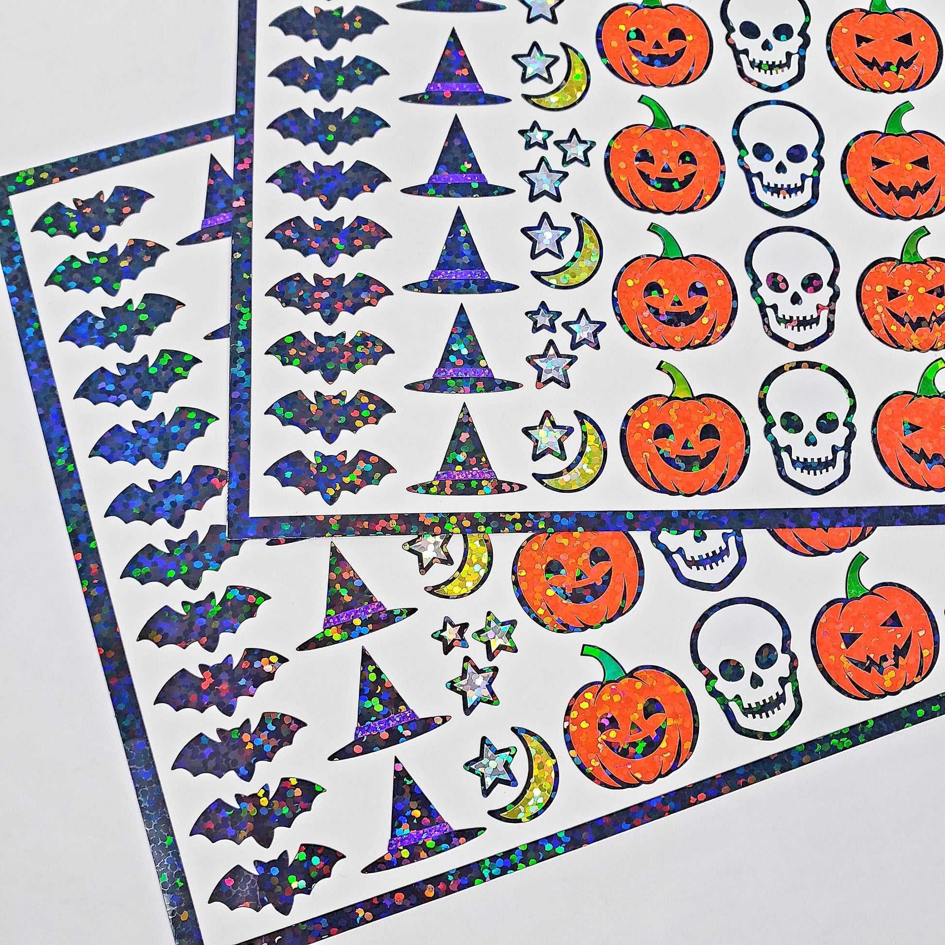 Halloween Stickers, set of 68 spooky sparkly glitter stickers of ghosts, bats, witch hats, pumpkins and skulls for fall and October 31.