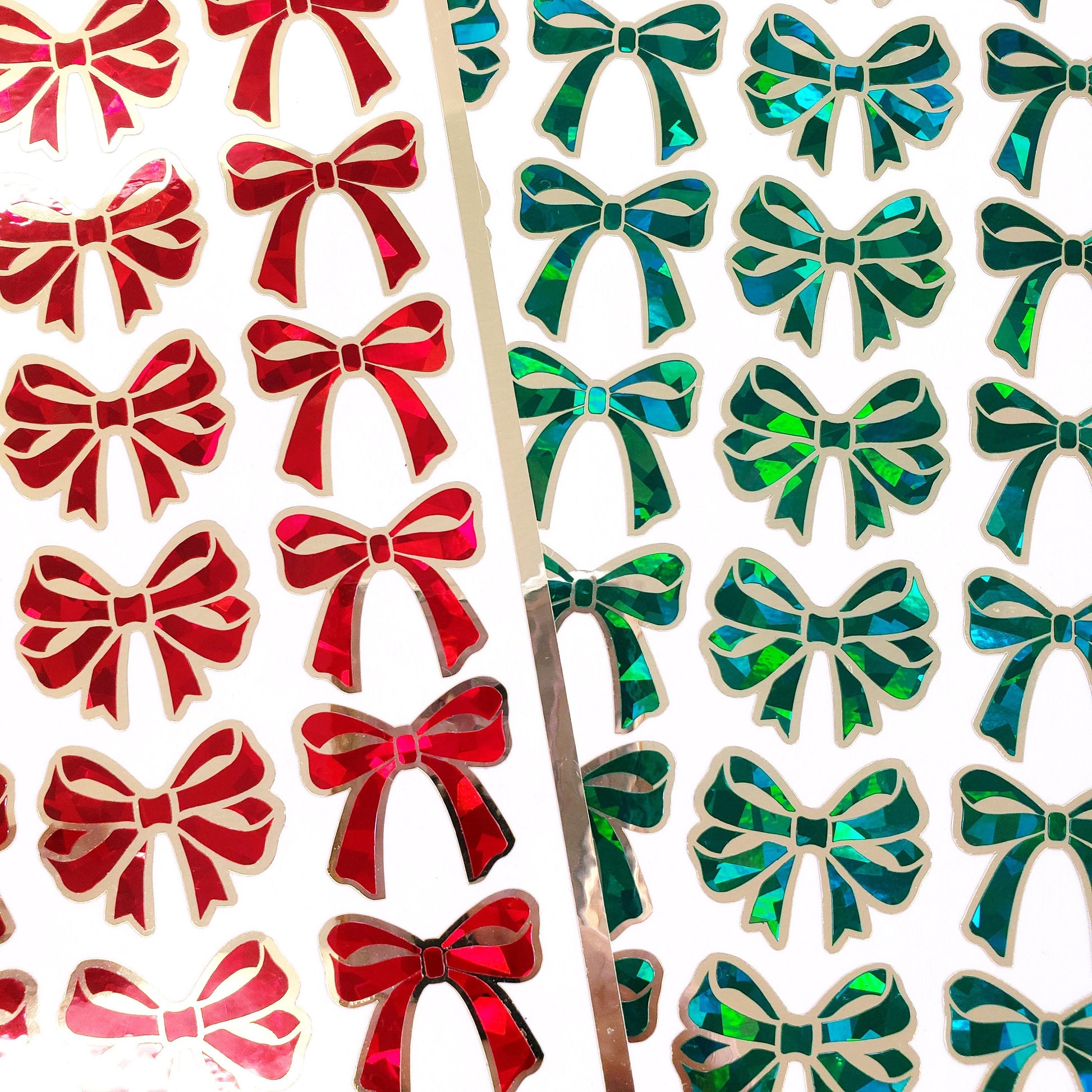 Christmas Bow Stickers, set of 28 red and gold festive ribbon shaped decals, peel and stick bows for holiday cards, ornaments and envelopes.