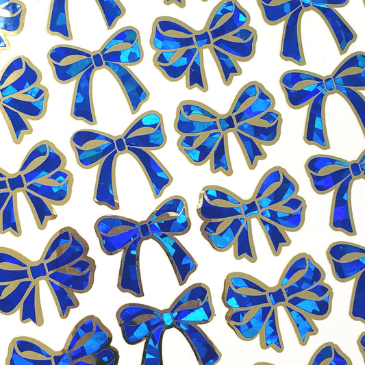 Holiday Bow Stickers, set of 28 blue and gold festive ribbon shaped decals, peel and stick bows for tags, cards, ornaments and envelopes.