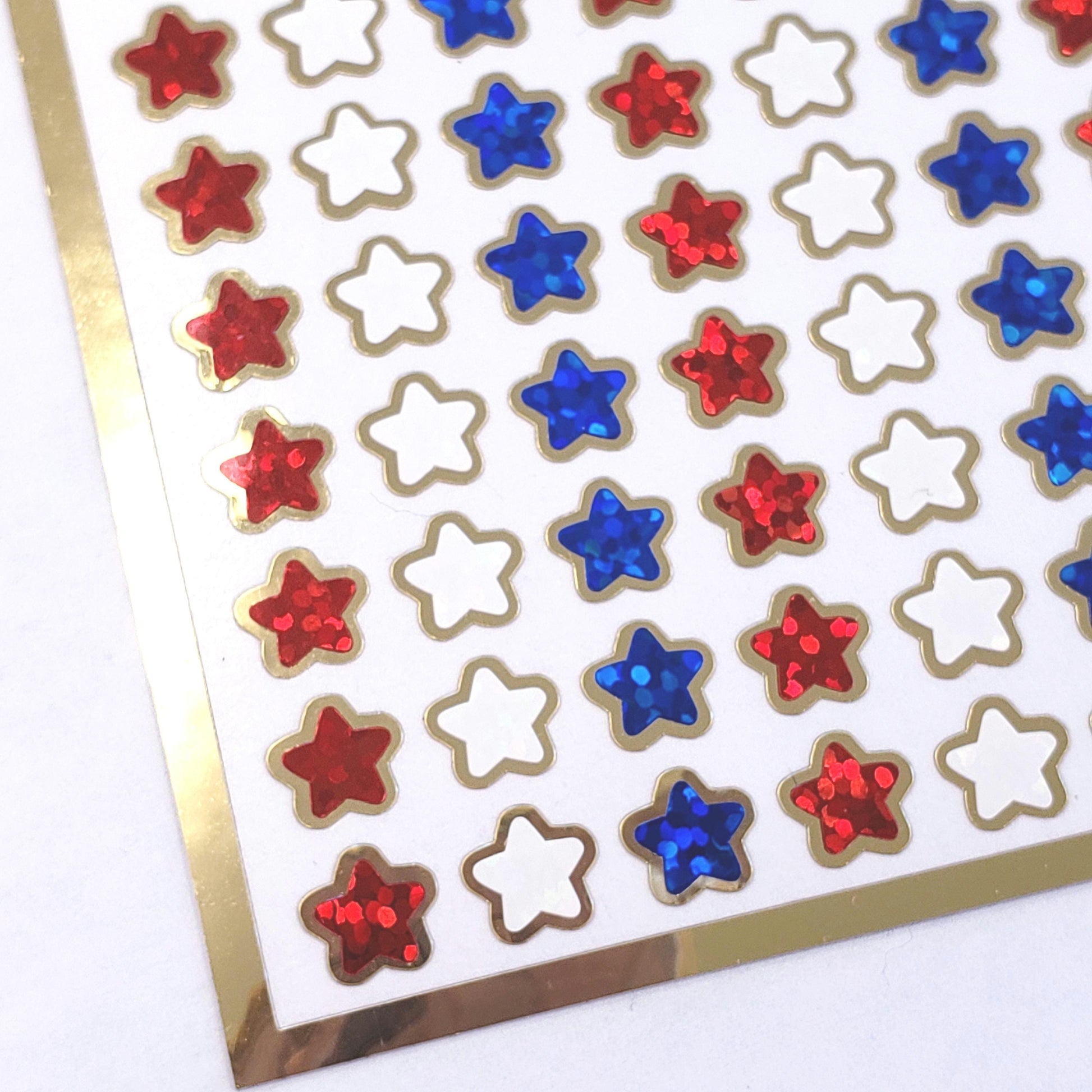 Extra Small Patriotic Star Stickers, set of 216 sparkly red, white and blue waterproof stars with gold outline, 8mm stars.