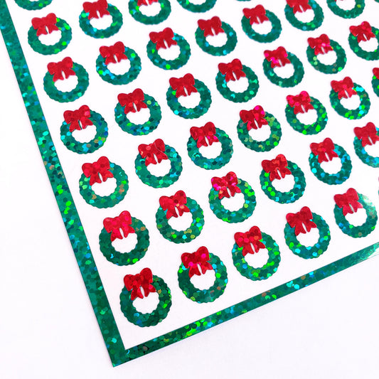 Christmas Wreath Stickers, set of 96 extra small green and red wreaths for holiday decor, card envelopes, ornaments, gift tags and crafts.