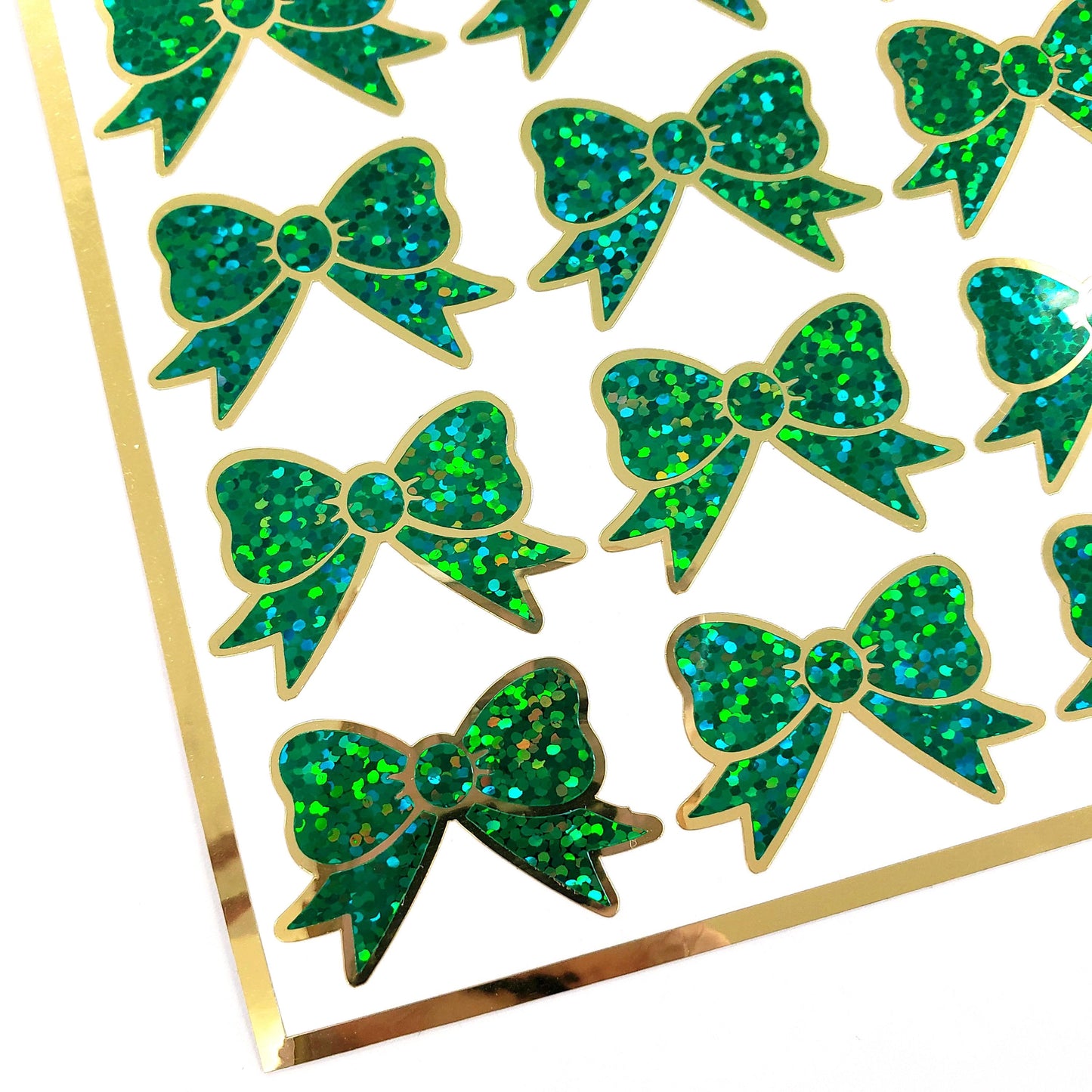 Green Christmas Bow Stickers, set of 18 small sparkly ribbons for cards, journals, ornaments, laptops and craft projects, each 1.5 inches.