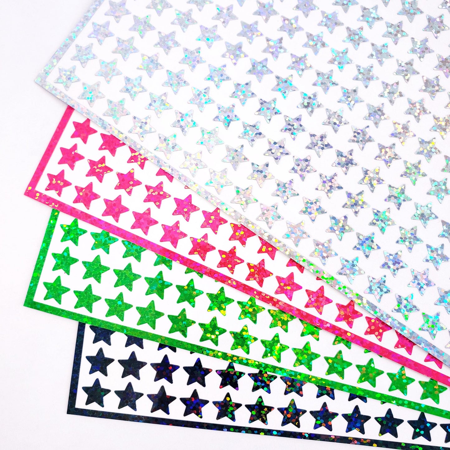 Star Sticker Bundle, set of 768 wicked sparkly stars in green, black, pink and silver, embellishments for journals, notebooks, and crafts.