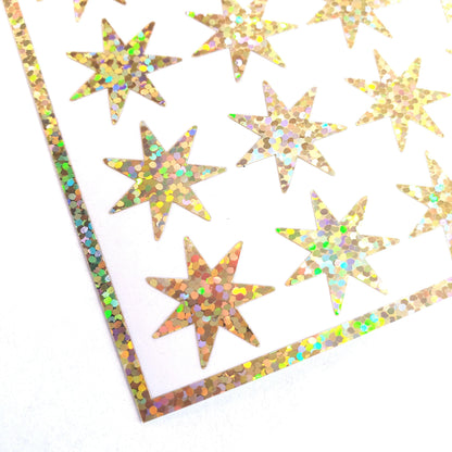 Gold Seven Point Starburst Stickers, set of 48 sparkly star stickers for ornaments, journals, planners, gift tags and craft projects.