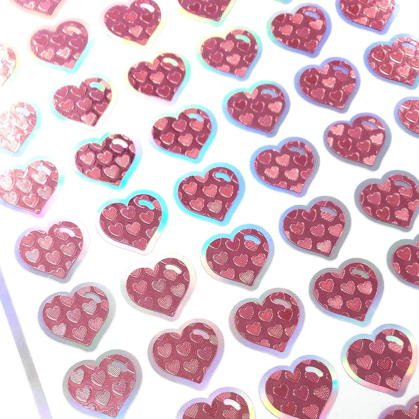 Pink Heart Stickers for Valentine's Day, set of 60 small heart decals for cards, envelopes, junk journals, and scrapbook embellishments.