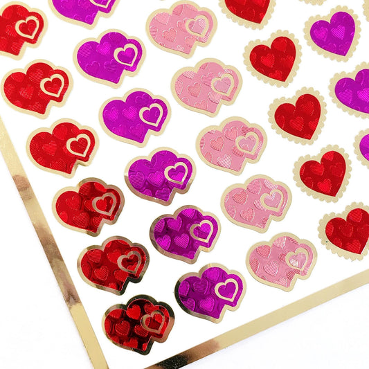 Heart Stickers for Valentine's Day, set of 78 small pink and red heart decals for cards, envelopes, journals, and scrapbook embellishments.