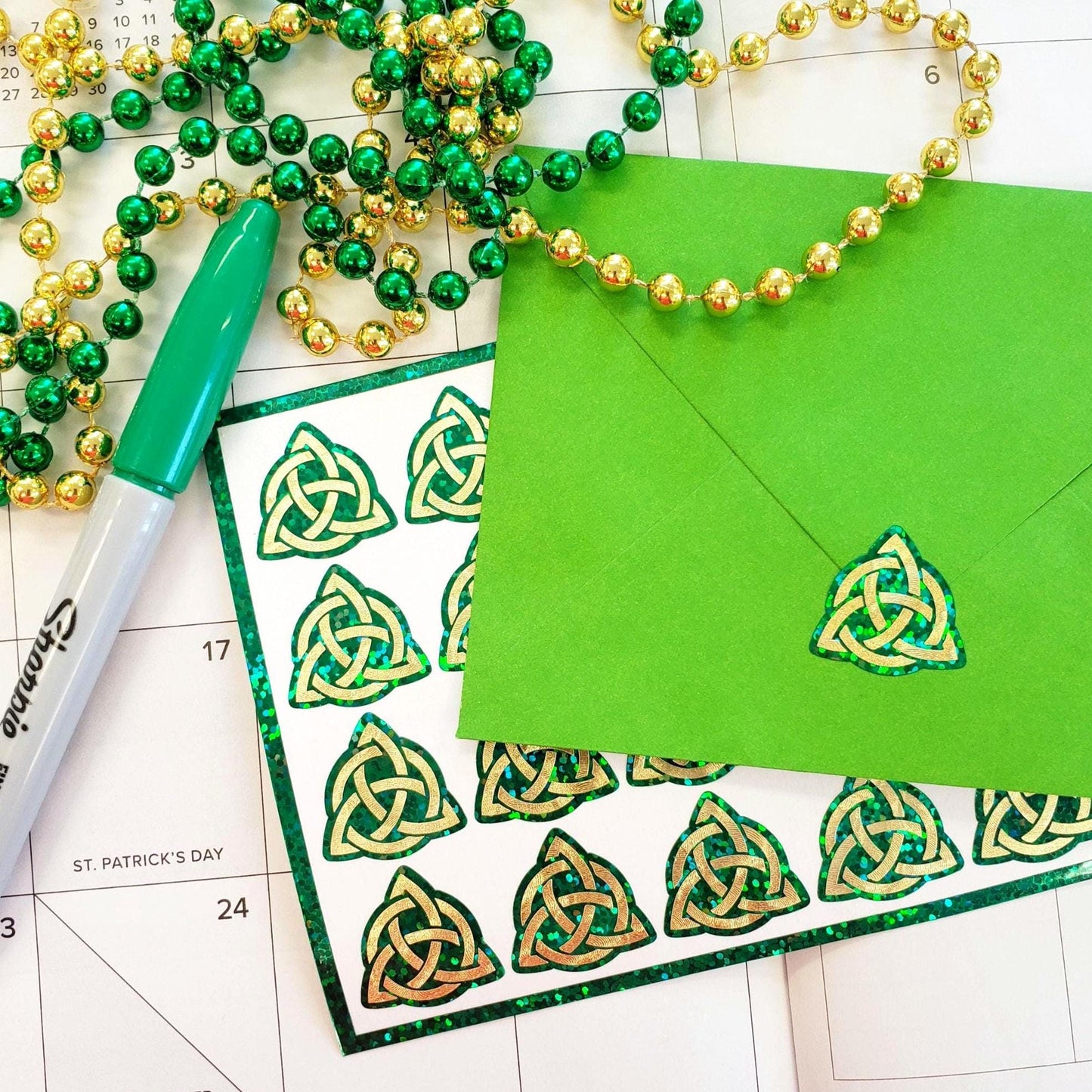 Celtic Trinity Knot Stickers – 20 Gold Knot Stickers on Sparkly Green Background – Irish Symbol – Peel & Stick Vinyl.